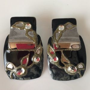 La Rage signed enamel silvertone metal earrings